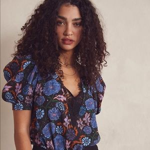 Free people floral “In the Moment” body Suit. Perfect condition.